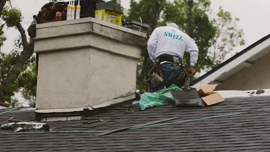 Swell Roofing Inc